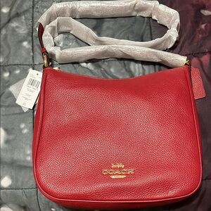 Coach Red Shoulder Bag with Gold Hardware and Adjustable Strap